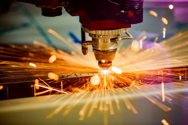 cnc laser cutting of metal, modern industrial technology. - manufacturing imagens e fotografias de stock