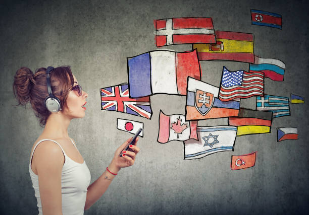 istock Young woman in headphones learning different languages 1030492368