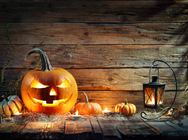 Halloween Pumpkins In Rustic Background With Lantern Jack O' Lantern On Wooden Table With Lantern halloween pumpkin decorations stock pictures, royalty-free photos & images