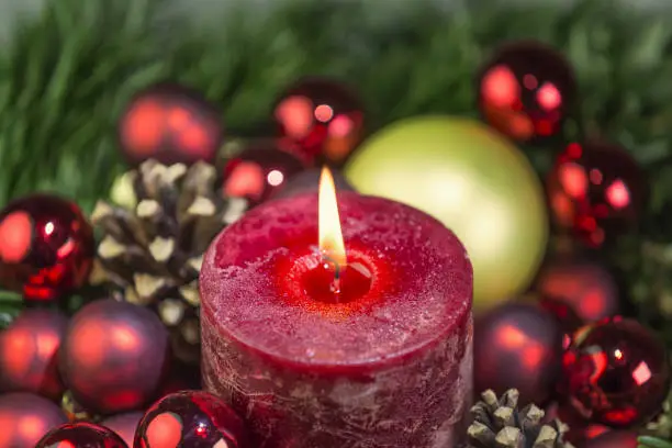 red Christmas candle with decor