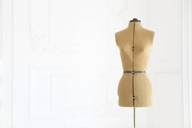 istock Mannequin  in the white room 1030499474