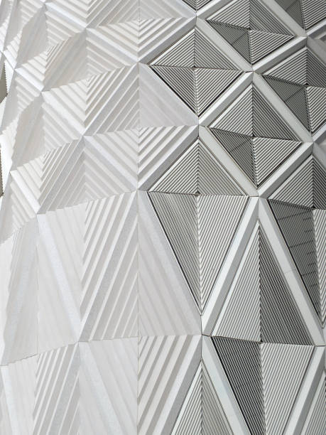 istock geometric diamond shaped white patterned and tiles on the wall of a modern building 1030502964