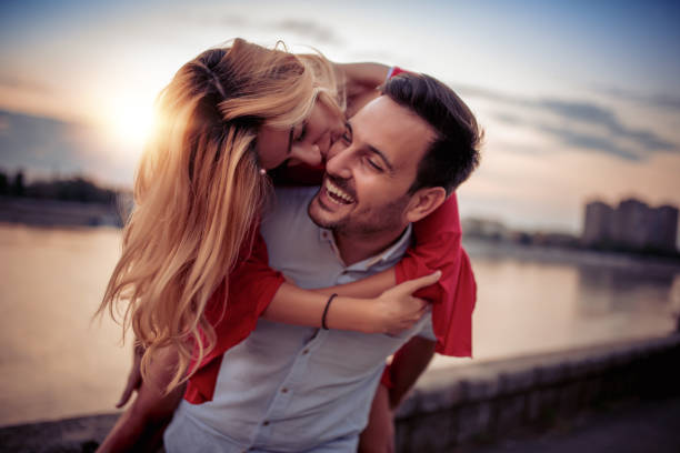 istock Happy young couple having fun outdoors 1030504104