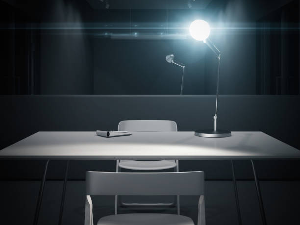 Dark interrogation room with switched-on lamp, 3d rendering. stock photo