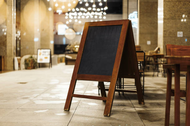 istock Close up of sandwich board next to restaurant. 1030515250