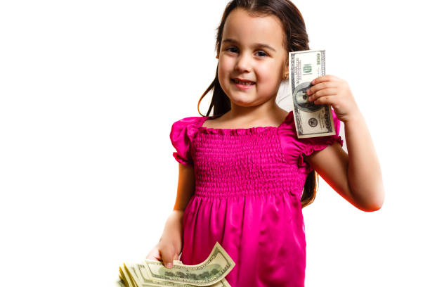 istock Happy child with money dollar. Isolated. On a white background. 1030518204
