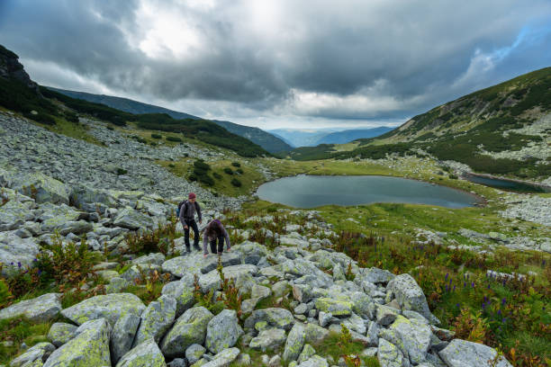 istock Young couple of hikers 1030521900