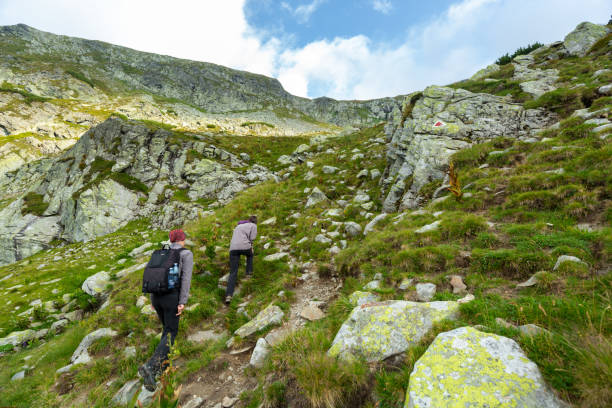 istock Young couple of hikers 1030521904