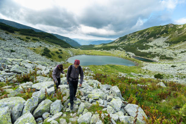 istock Young couple of hikers 1030521910