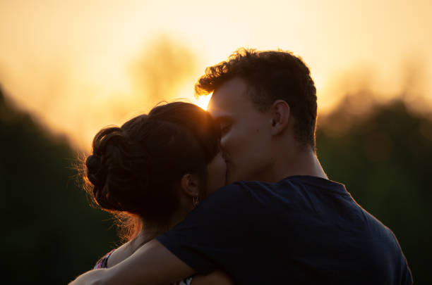 istock Young couple at sunset 1030522488
