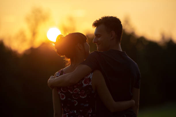 istock Young couple at sunset 1030522524