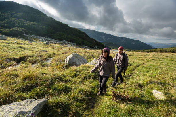 istock Young couple of hikers 1030522720