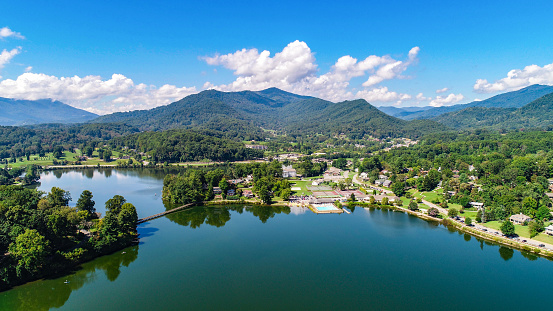 Drone Aerial of Lake Junaluska near Waynesville and Maggie Valley North Carolina NC during Autumn Fall.