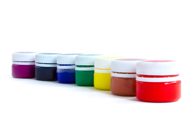 istock rainbow paints in jars on an isolated white background 1030537188