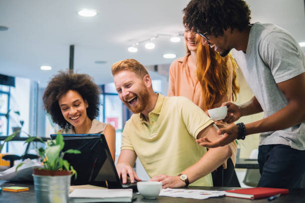 istock Group of smiling people having a meeting 1030543784