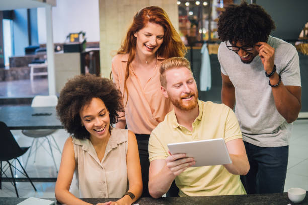 istock Happy business people in an office 1030544002