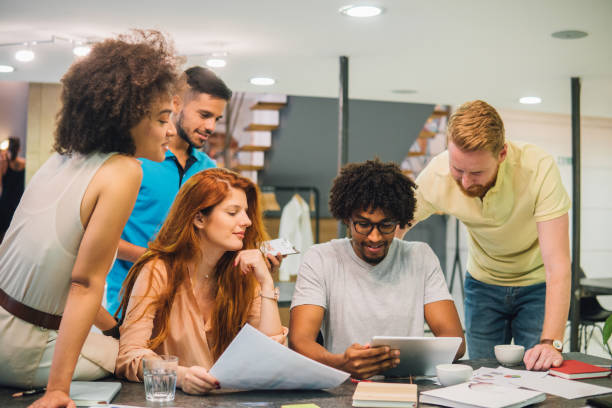 istock Group of people working together 1030546786