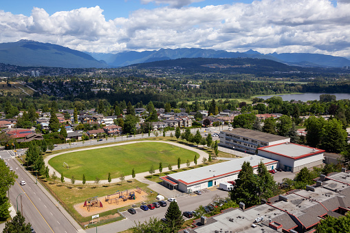 Aerial view of the modern city during a vibrant summer day. Taken in Burnaby, Greater Vancouver, BC, Canada.