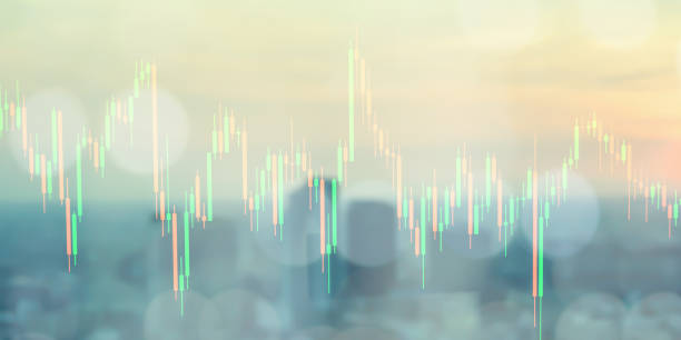 istock Abstract blurred sunset city double exposure of stock graph market exchange data board with light and soft color gradient background concept. 1030558904
