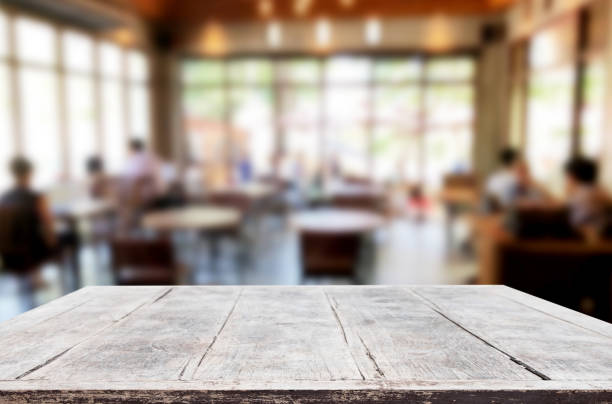 istock Close-Up Of Wooden Table In Restaurant 1030563620