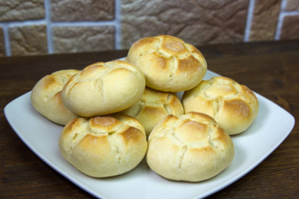 istock Close up bread on a plate on a wooden table 1030570442