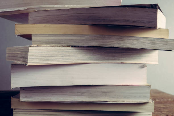 istock Close-Up Of Books On Table 1030583652