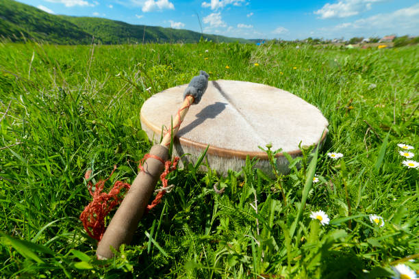 istock Shamanic tambourine on a meadow 1030584092