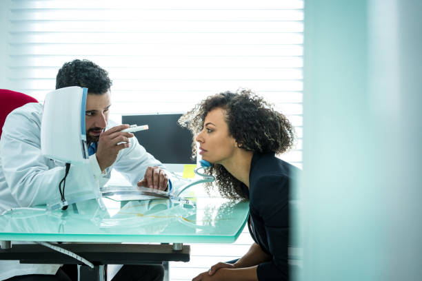 istock Doctor examines his patient 1030585842
