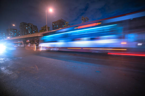 istock bus with light with motion blur on the road 1030600088