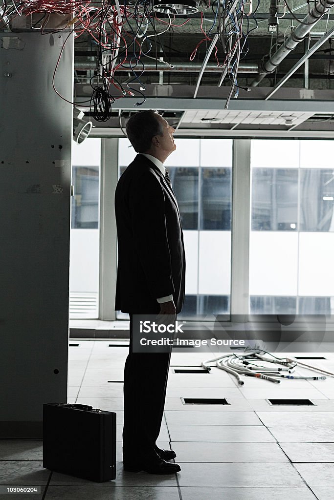 Businessman in abandoned office - 로열티 프리 70-79세 스톡 사진