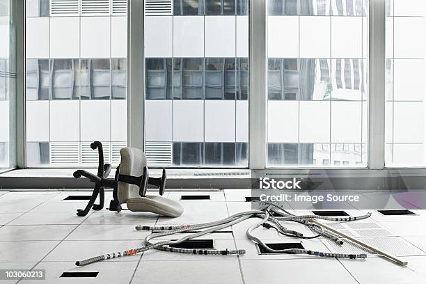 Office Chair And Cables On Floor Stock Photo - Download Image Now - Bankruptcy, Office, Abandoned
