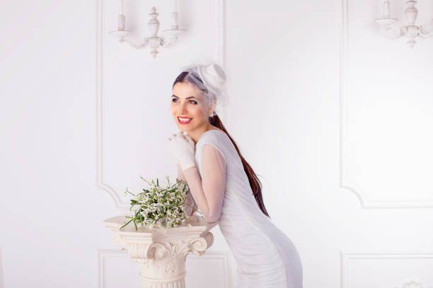 istock Charming bride with flowers in elegant design 1030605352