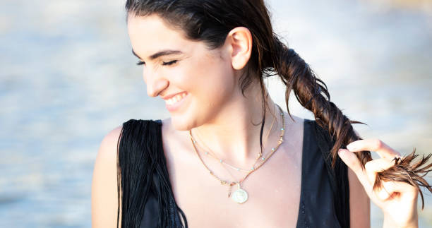 istock Natural pretty girl on beach 1030613126