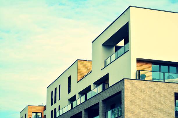 istock Modern apartment building exterior. Retro colors stylization 1030613158