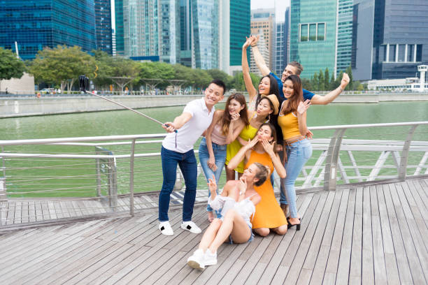 istock Friends taking selfie, hands up 1030623504