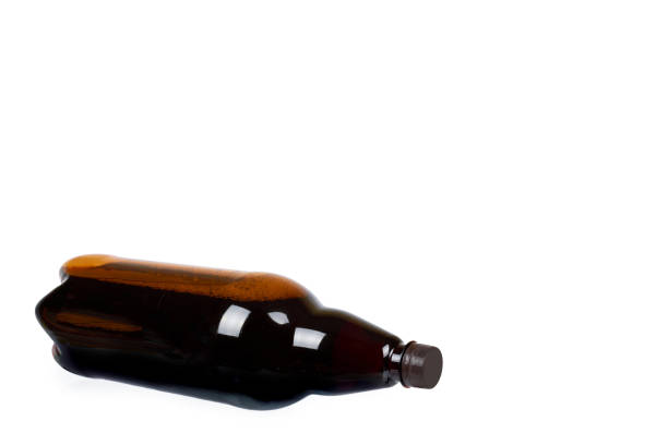 istock Dark brown plastic bottle of beer or kvass isolated on a white background, copy space template. 1030626732