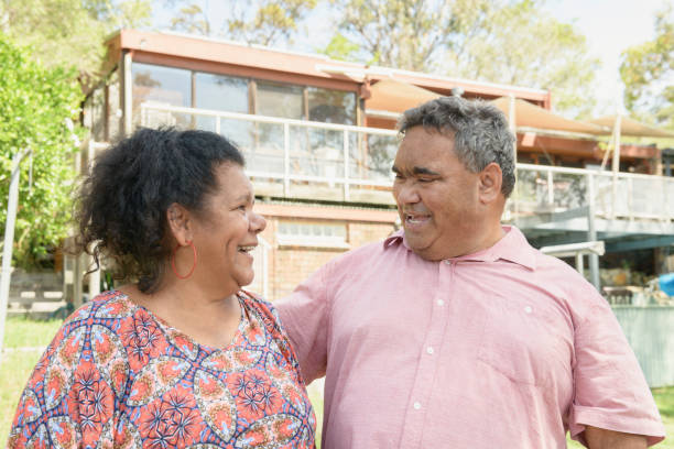 istock Mature Aboriginal couple smiling face to face 1030629790