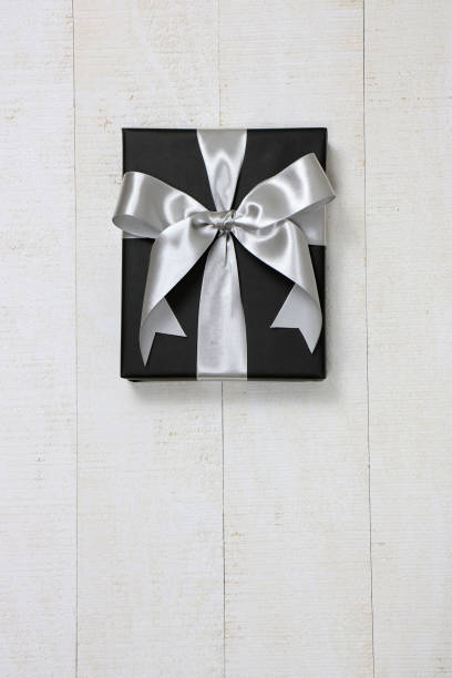 istock gift, gift box, paper wrap, gift wrap, ribbon, event, anniversary, black Friday, black, silver, Christmas, pattern, texture, pop 1030657830