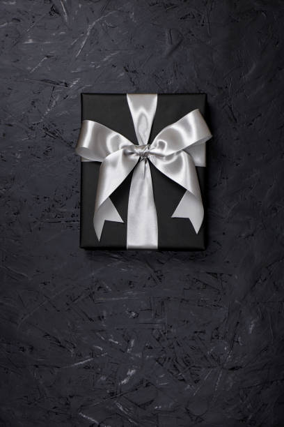 istock gift, gift box, paper wrap, gift wrap, ribbon, event, anniversary, black Friday, black, silver, Christmas, pattern, texture, pop 1030657860