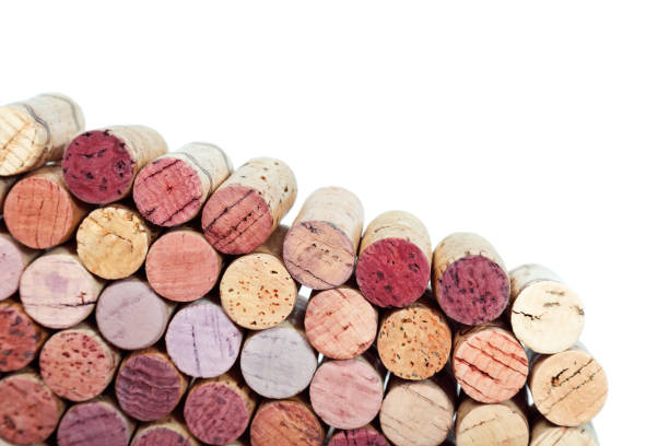 istock Colorful corks from white and red wine bottles isolated on white background 1030689166