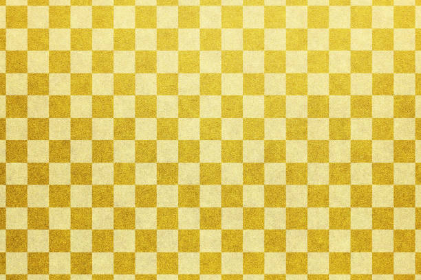 istock Japanese gold checkered pattern paper texture or vintage background 1030692038