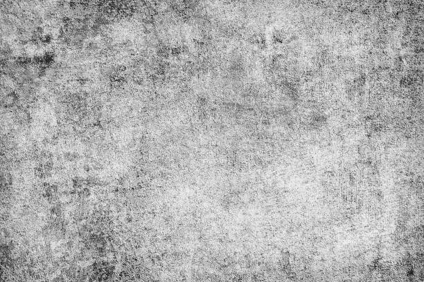istock The texture is black and white in grunge style. Abstract monochrome background. Pattern of chips, cracks, scuffs, dust, stains 1030702914