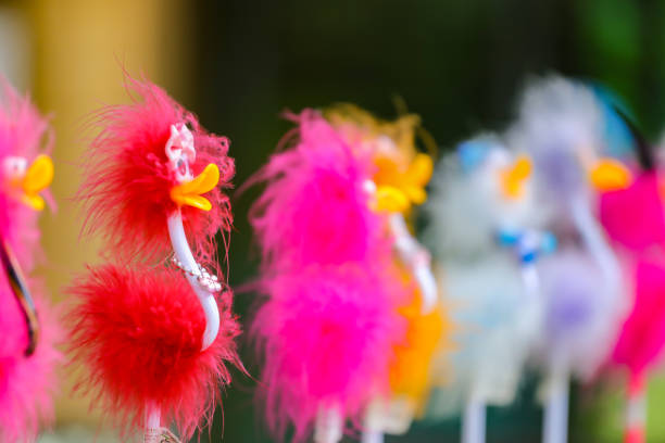 bird toy stand on the line ,selected focus