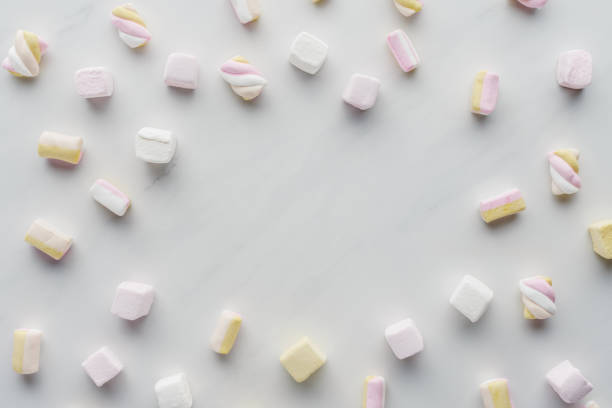 istock top view of tasty colored marshmallows on white surface 1030734292