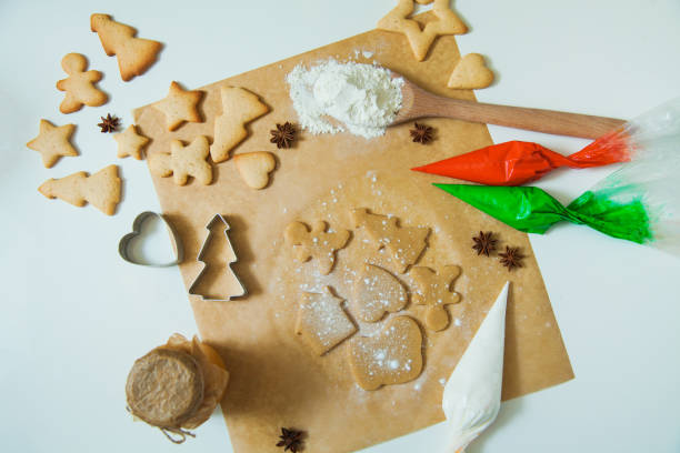 istock Cooking Christmas gingerbread cookies decorating for new year celebration 1030737294