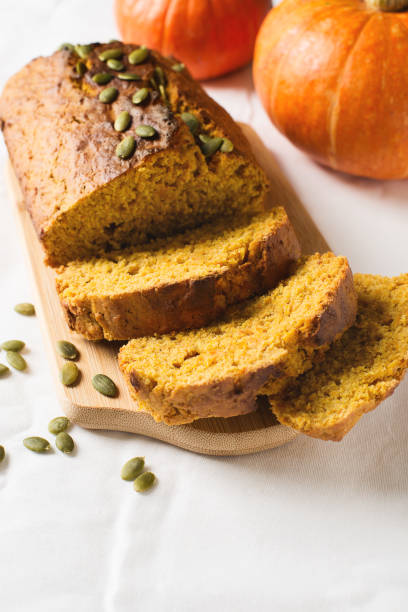 istock Homemade pumpkin loaf cake on white background. 1030737364