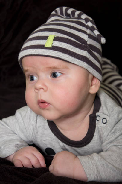 istock Adorable Striped Baby Boy 1030740808