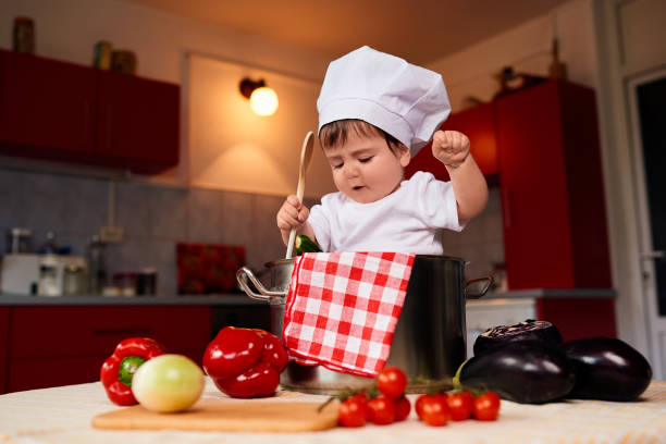 istock funny baby girl inside pot 1030744626