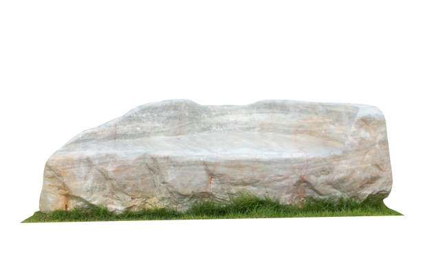chairs made of marble on green grass. Isolated on white background, clipping path