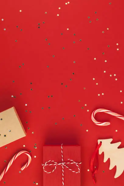 Photo of New Year or Christmas presents red background